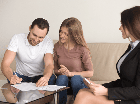 Happy family sitting together representing family law and protection services
